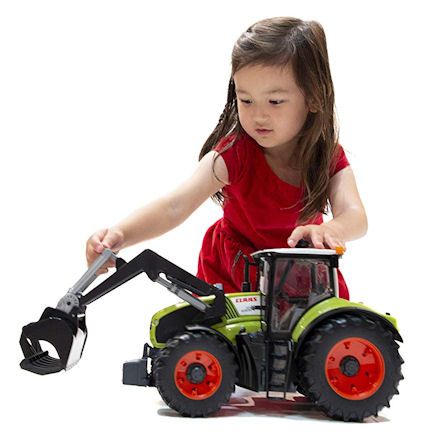 Bruder 03013: Claas Axion 950 Tractor, child playing