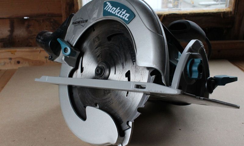 Makita circular saw on woodworking bench